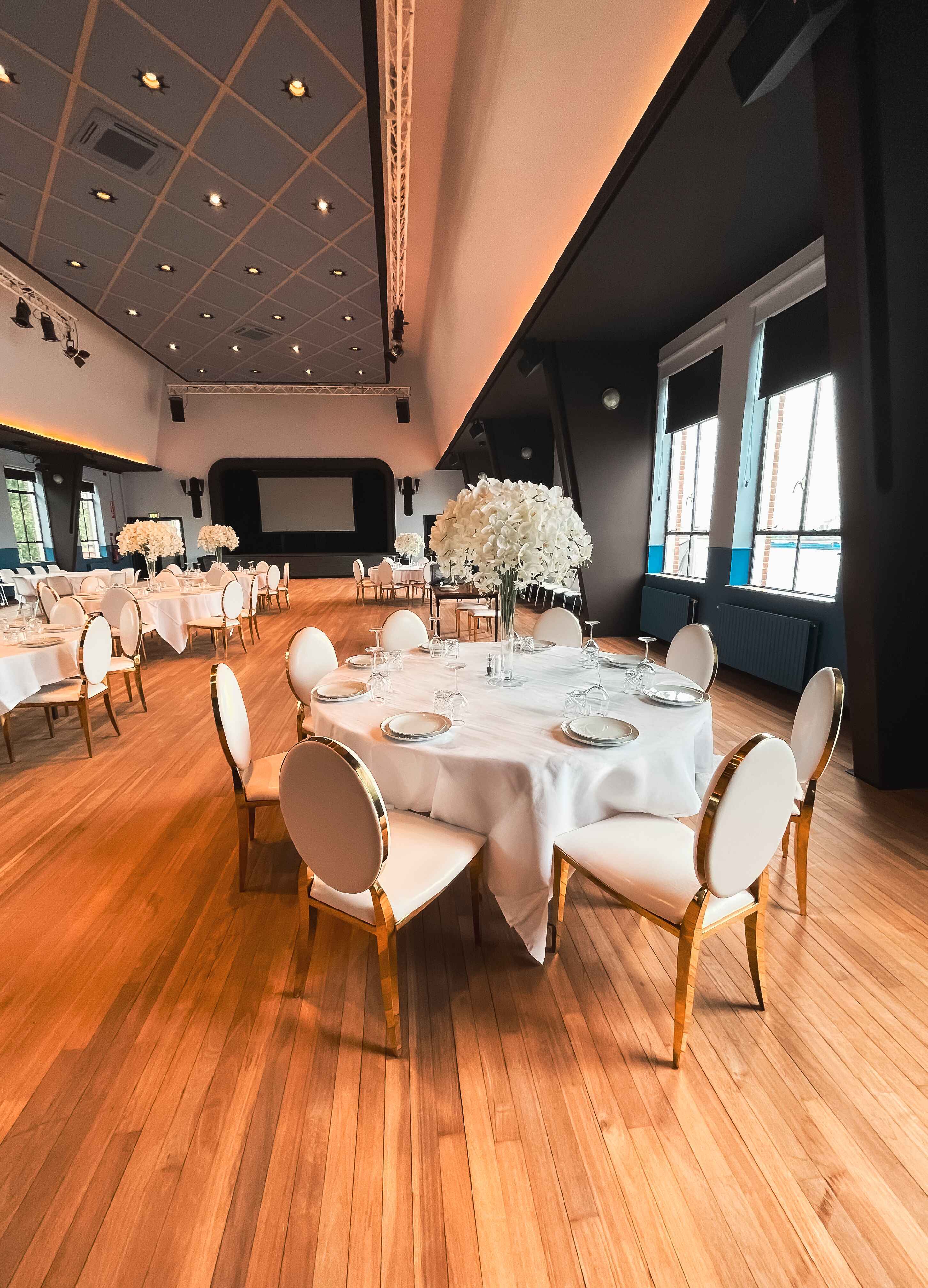 Dinner -The Theatre - white round table setting