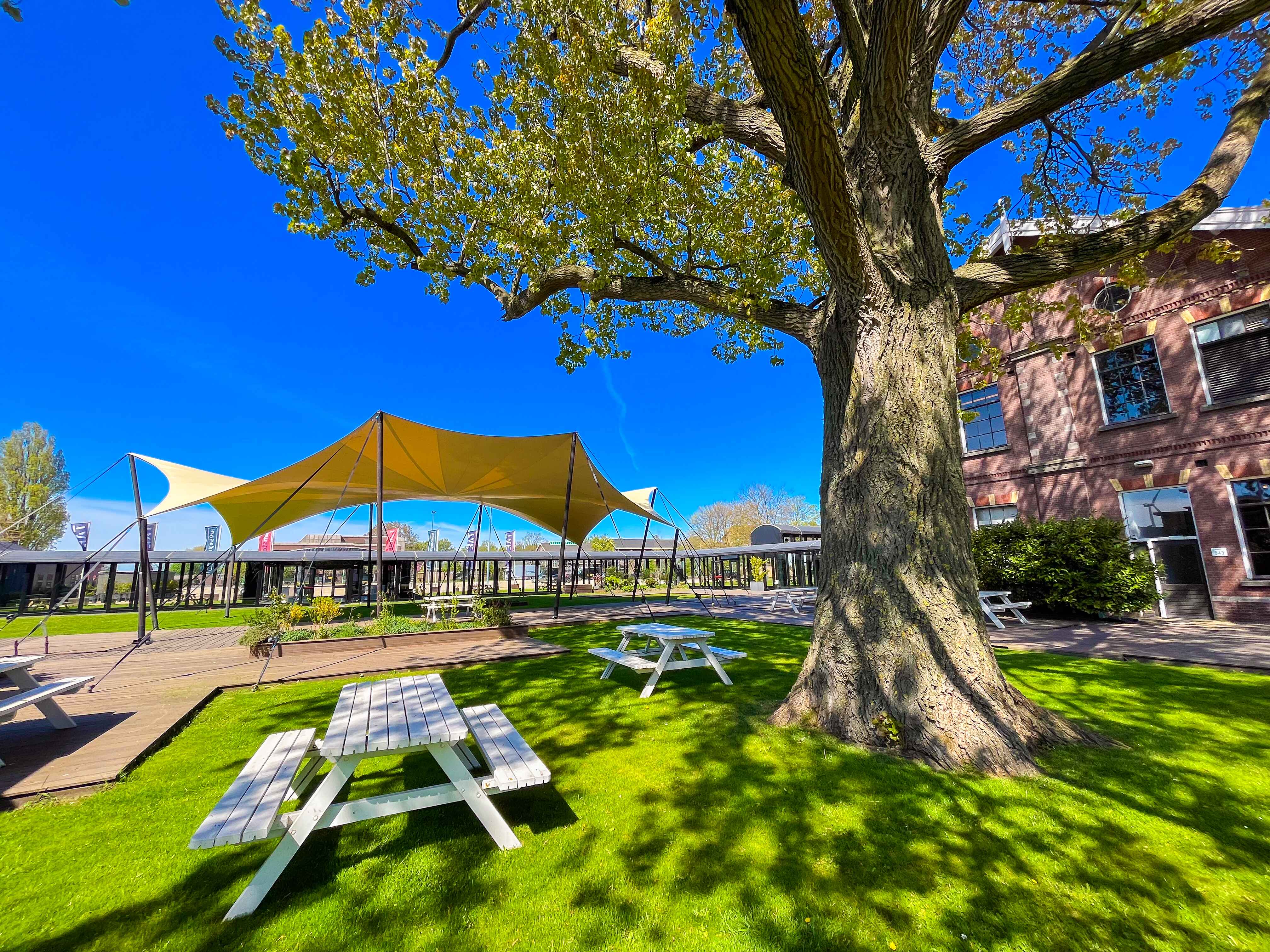 Event Garden - tent "Outdoor Event Garden at Taets Art and Event Park in Amsterdam and Zaandam, a scenic venue for weddings, corporate events, dinners, and outdoor gatherings."