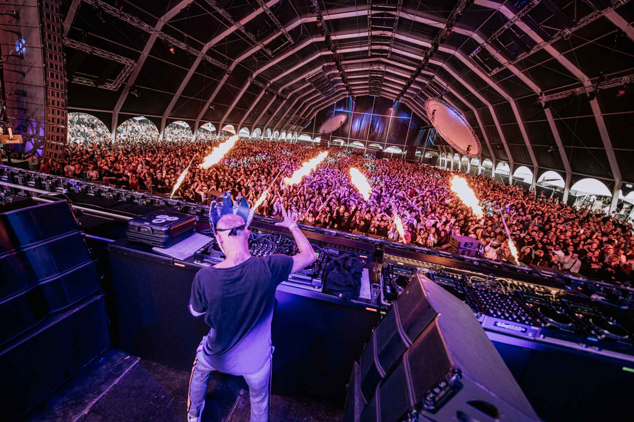 "Festival at Taets Art and Event Park near Amsterdam and Zaandam, with outdoor stages, live performances, and vibrant crowds."