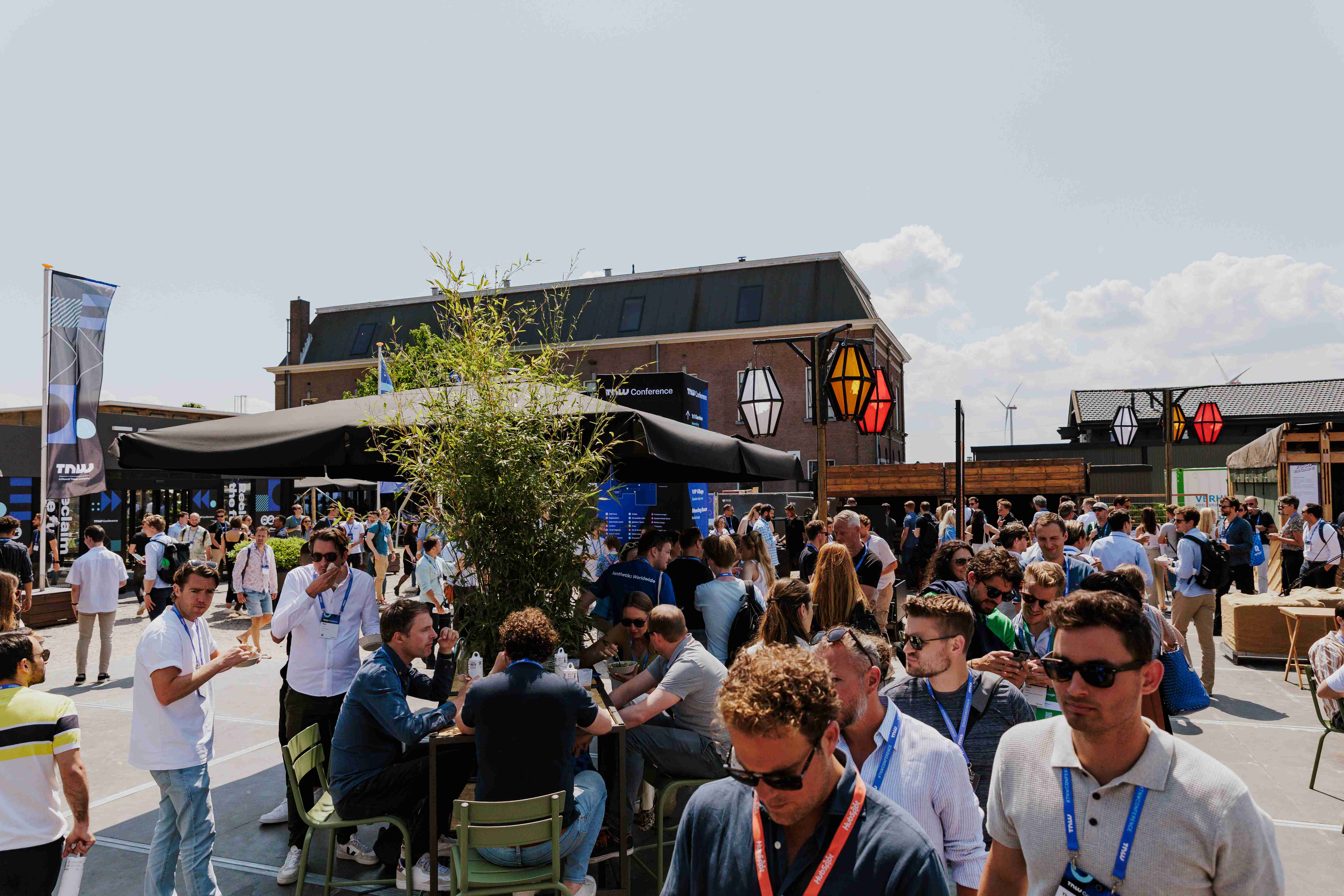 "Festival at Taets Art and Event Park near Amsterdam and Zaandam, with outdoor stages, live performances, and vibrant crowds."