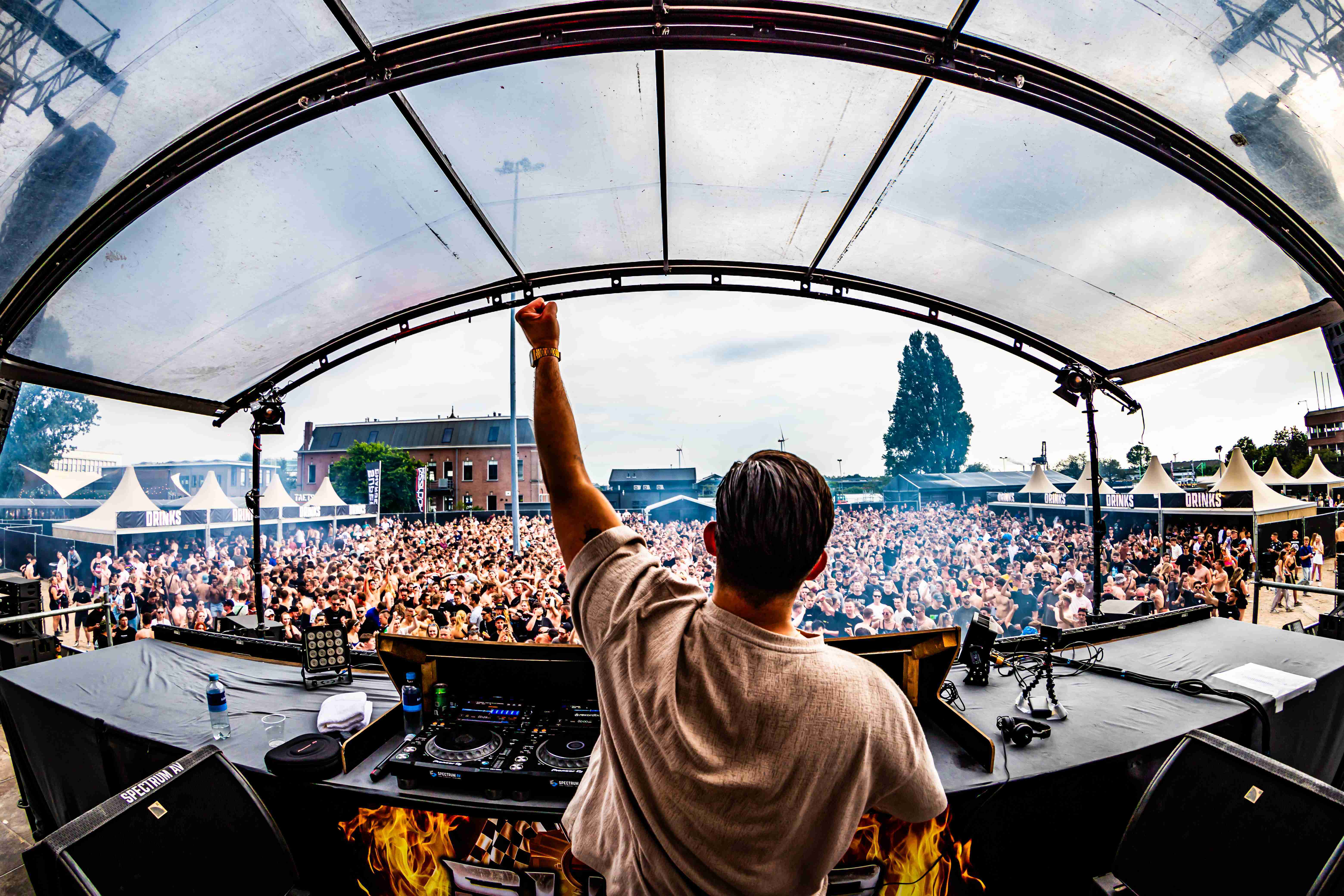 "Festival at Taets Art and Event Park near Amsterdam and Zaandam, with outdoor stages, live performances, and vibrant crowds."