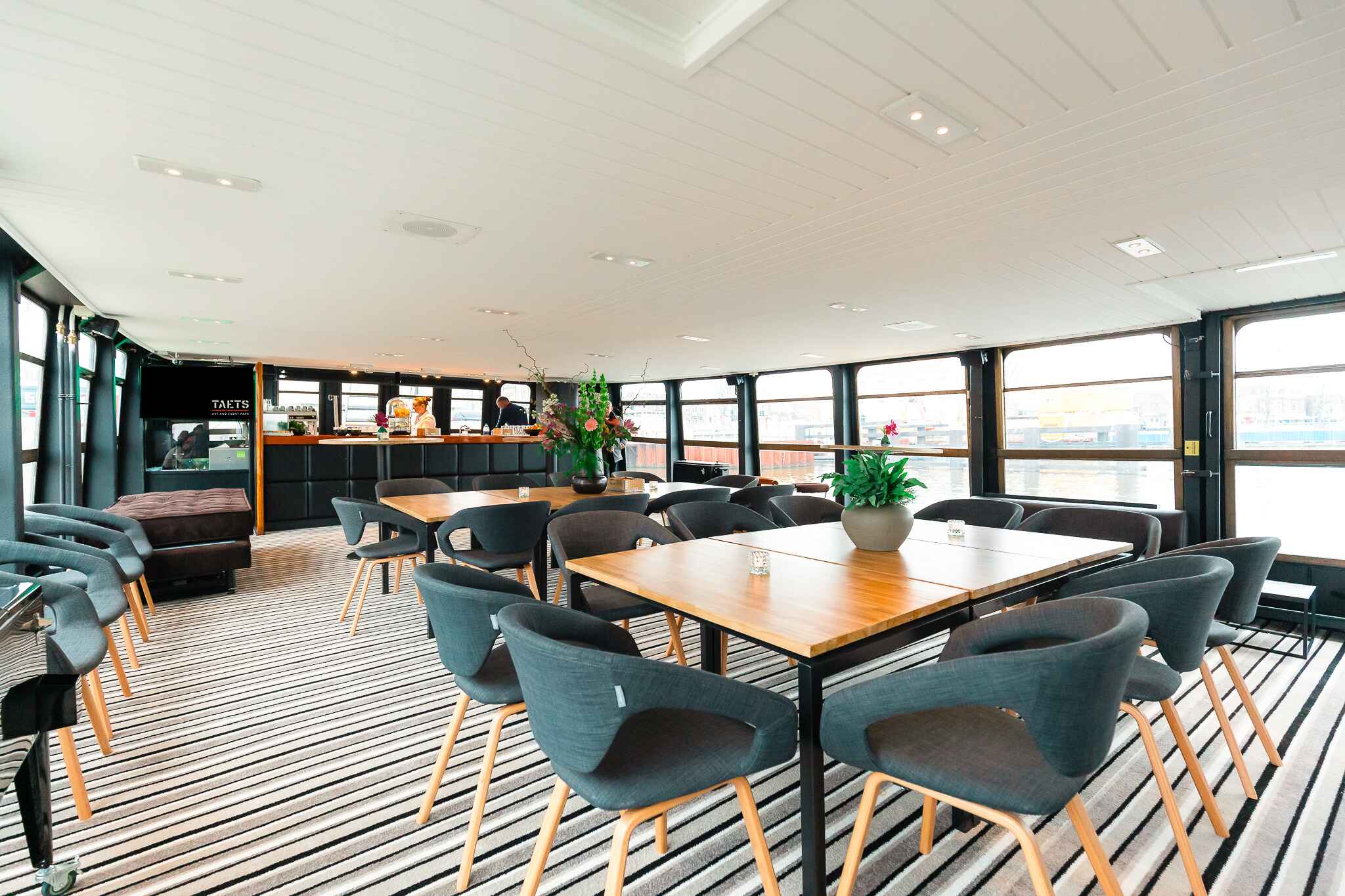 Hembrug ÉÉN - lounge setting 1 "Hembrug Event Boat at Taets Art and Event Park in Amsterdam and Zaandam, a unique venue on water for private gatherings, corporate events, and weddings."