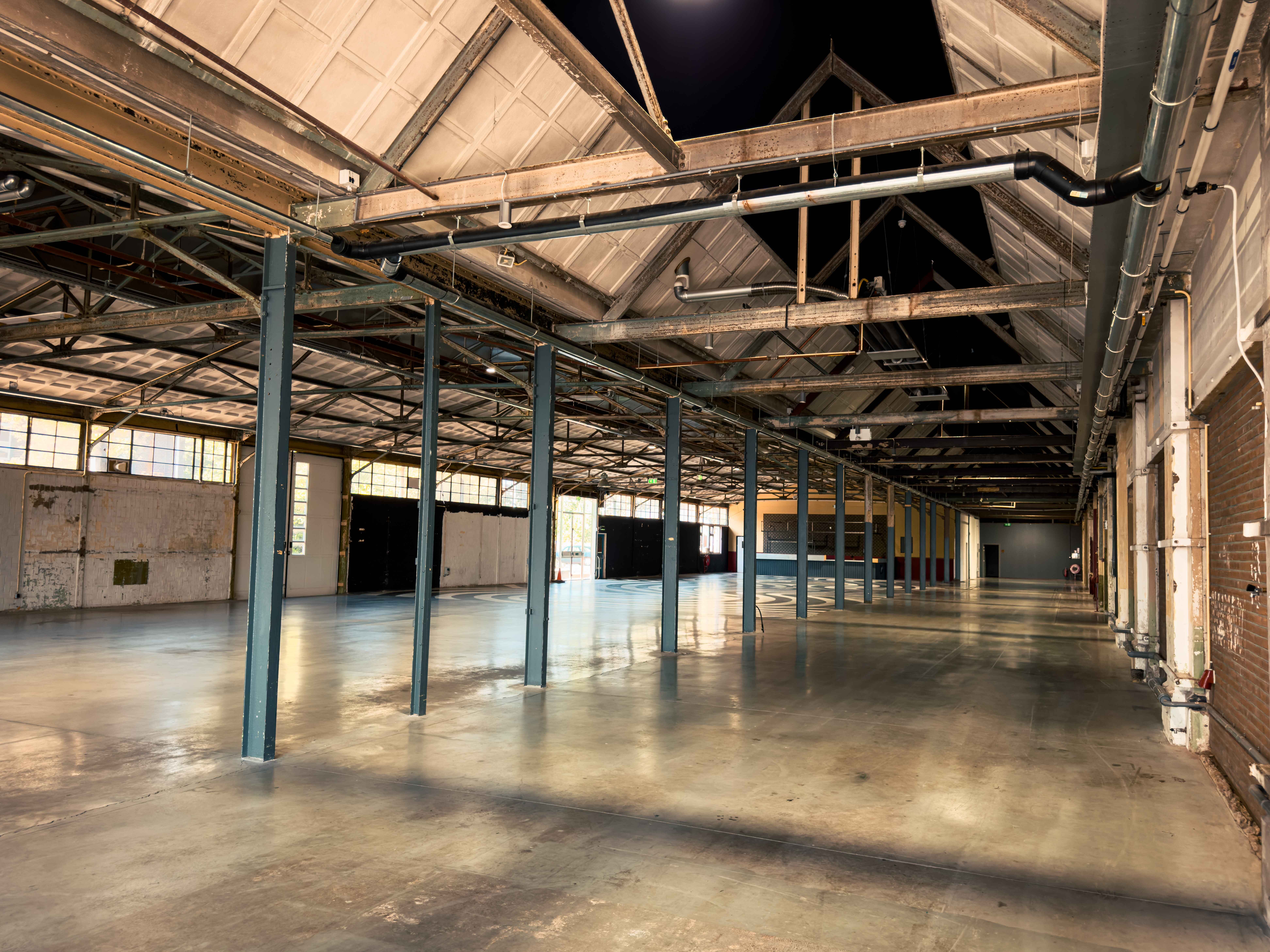 "Yada Yada event space at Taets Art and Event Park in Amsterdam and Zaandam, an industrial venue perfect for weddings, conferences, dinners, dance events, and more, set in a historic munitions factory."