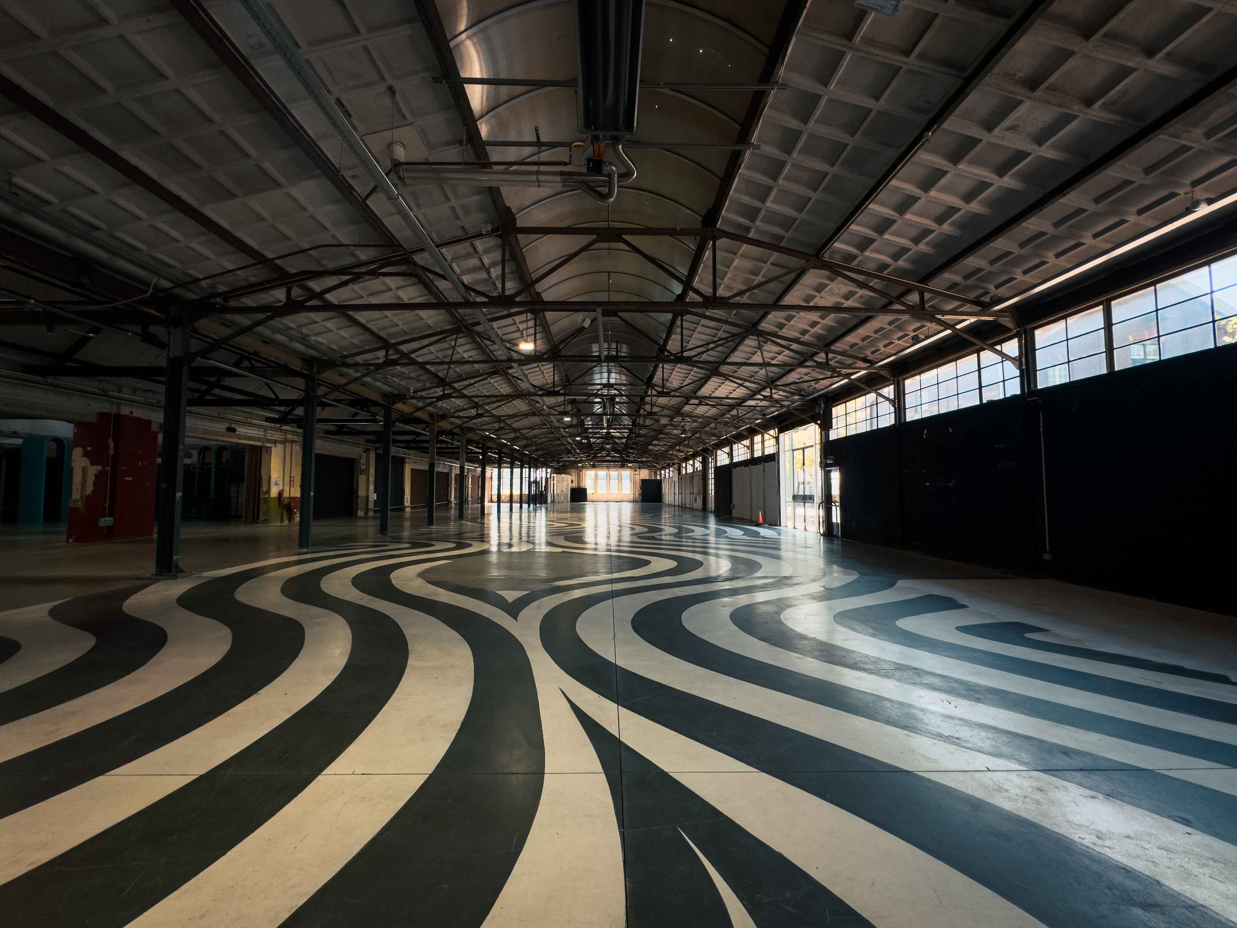 "Yada Yada event space at Taets Art and Event Park in Amsterdam and Zaandam, an industrial venue perfect for weddings, conferences, dinners, dance events, and more, set in a historic munitions factory."