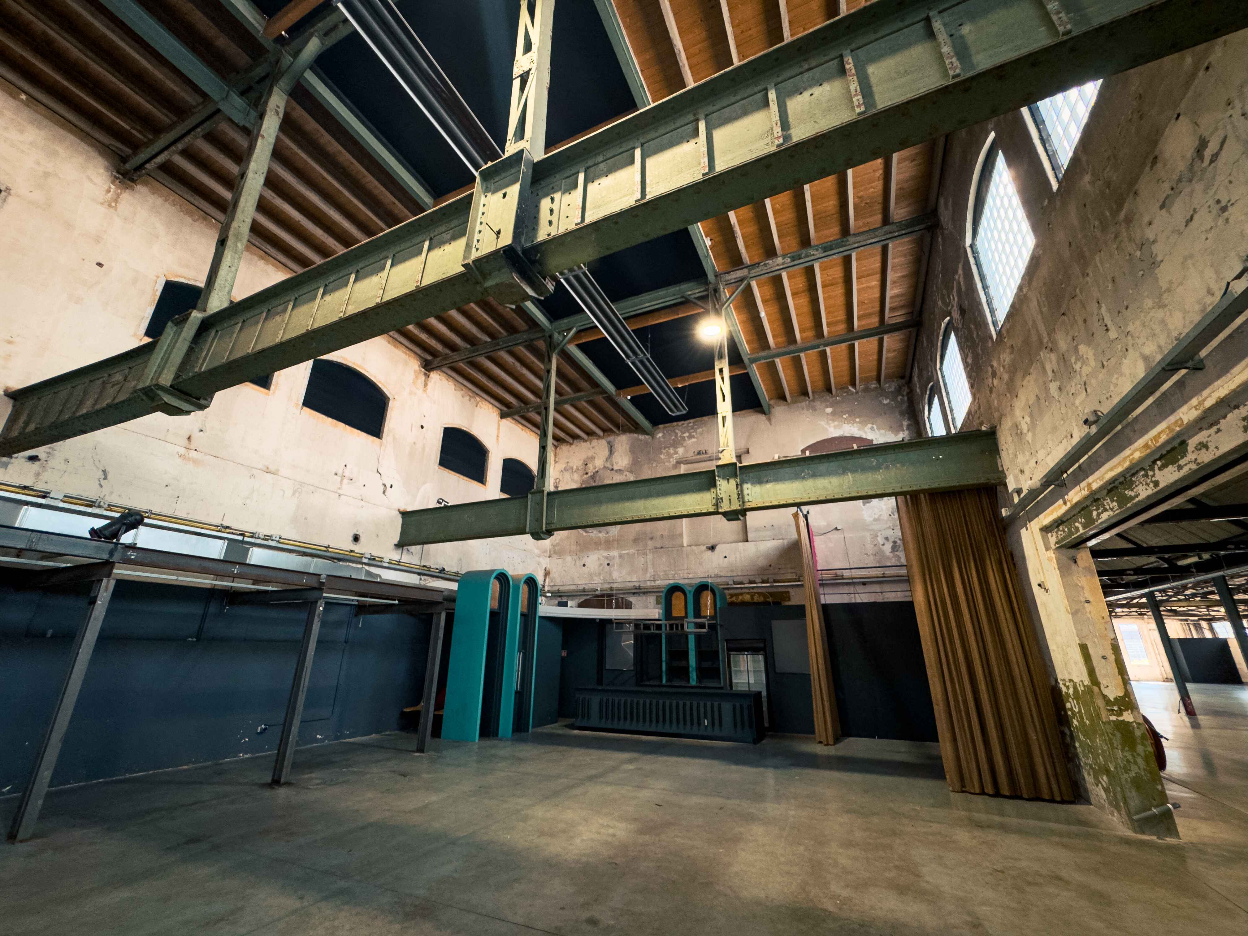 "Yada Yada event space at Taets Art and Event Park in Amsterdam and Zaandam, an industrial venue perfect for weddings, conferences, dinners, dance events, and more, set in a historic munitions factory."